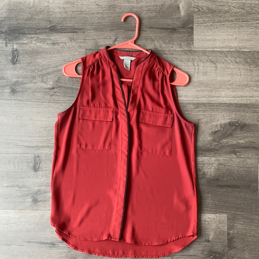 H&M button down blouse with pocket detail and black piping
